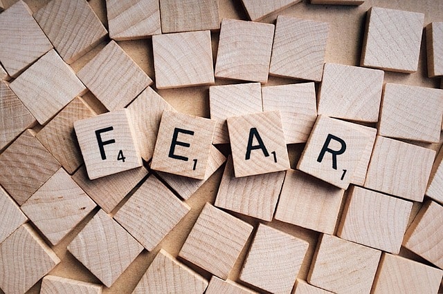 picture of scrabble letters that spell fear. overcoming financial fears.