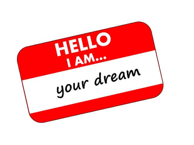 quit your job to live the life of your dreams. name tag reading hello i am your dream